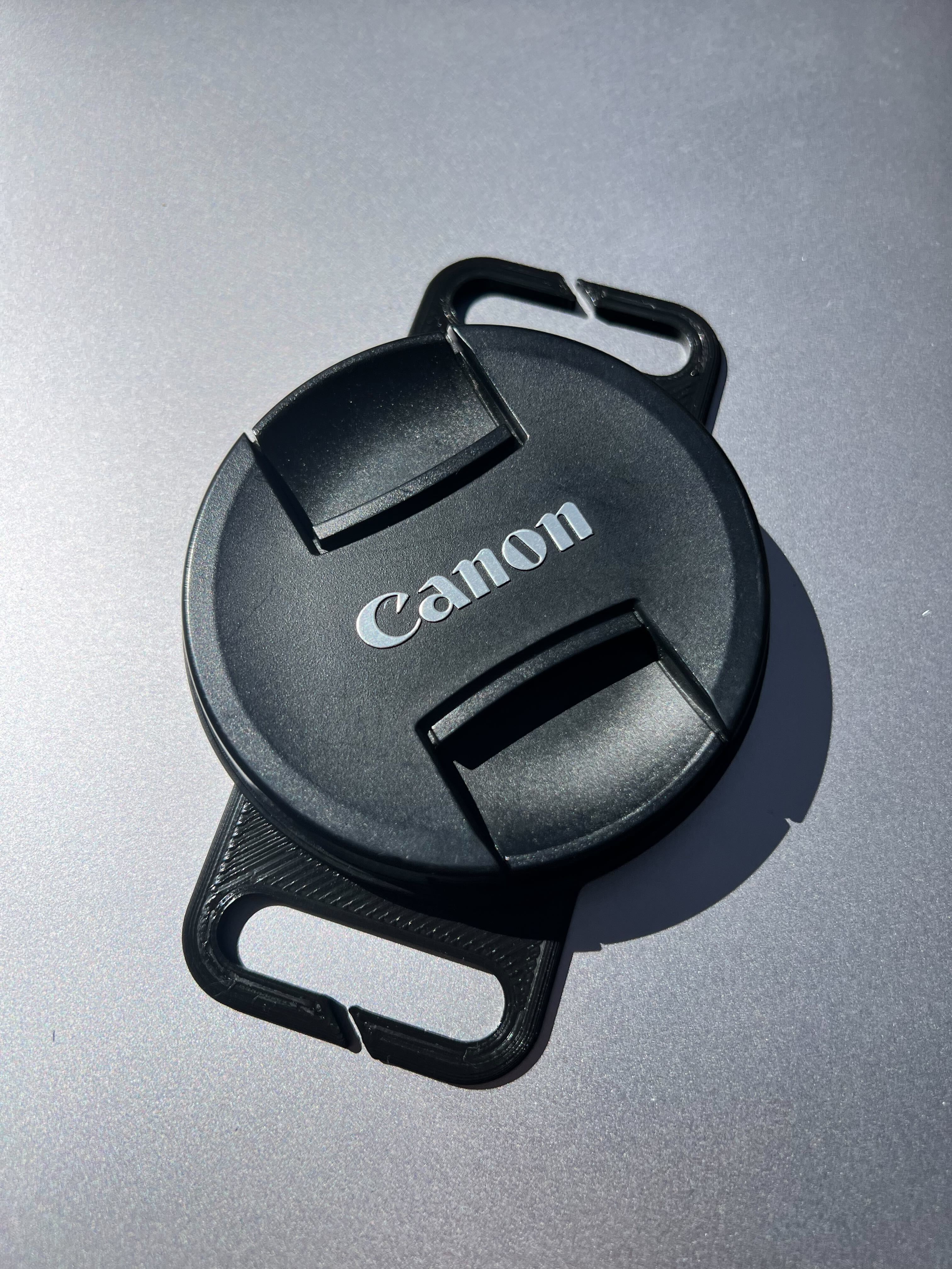 Camera lens cap holder by ChiefFluffy Download free STL model