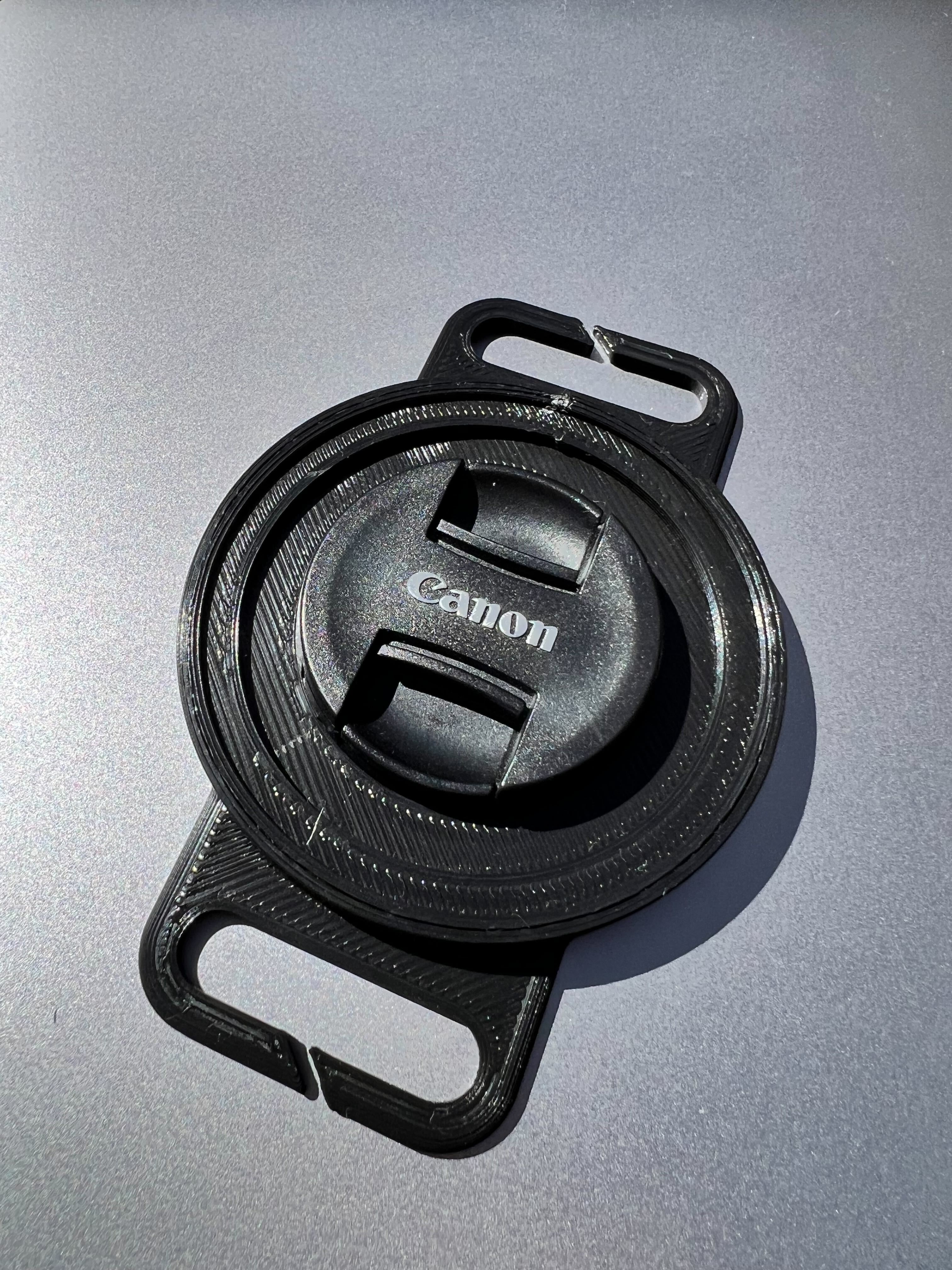 Camera lens cap holder by ChiefFluffy Download free STL model