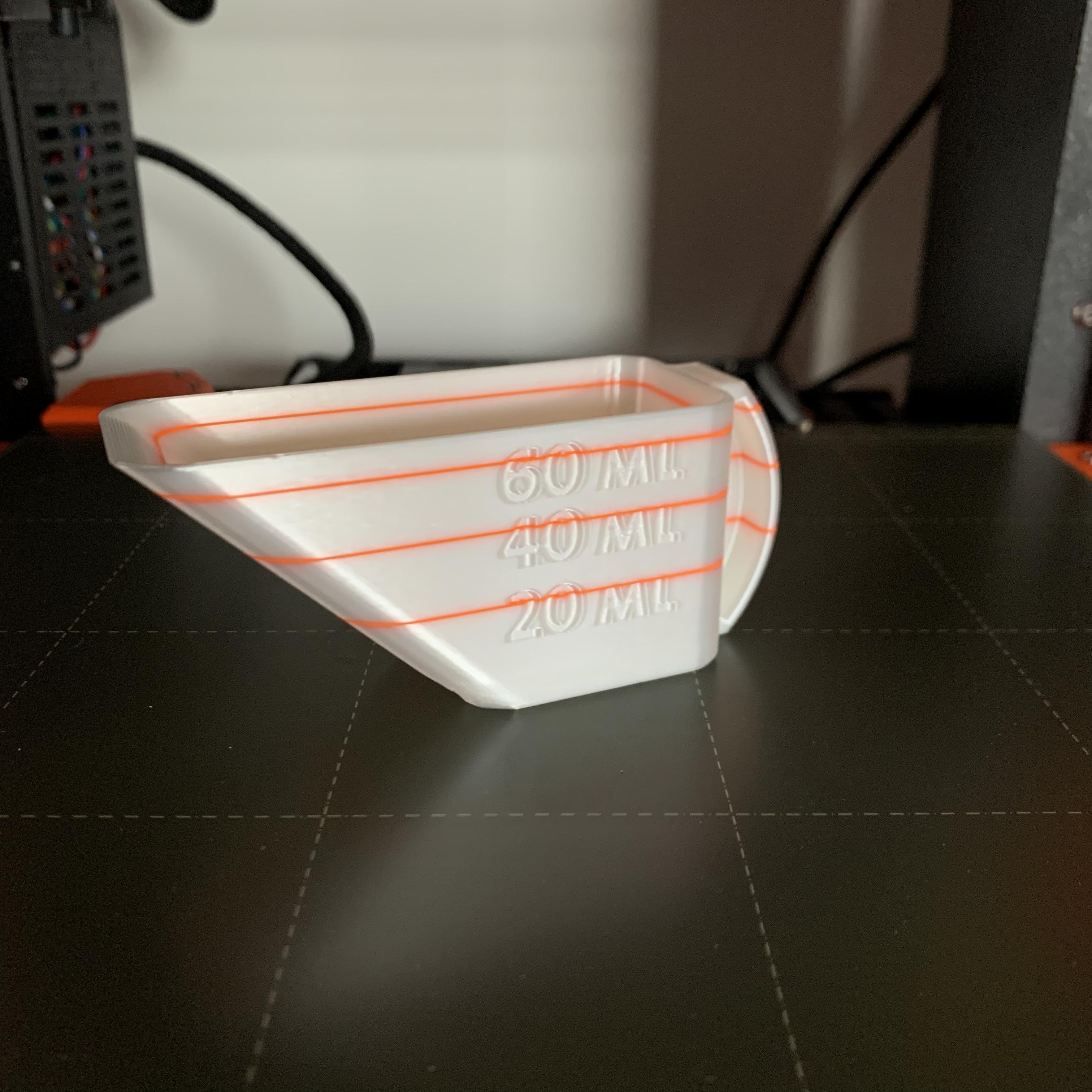 Washing powder measuring cup
