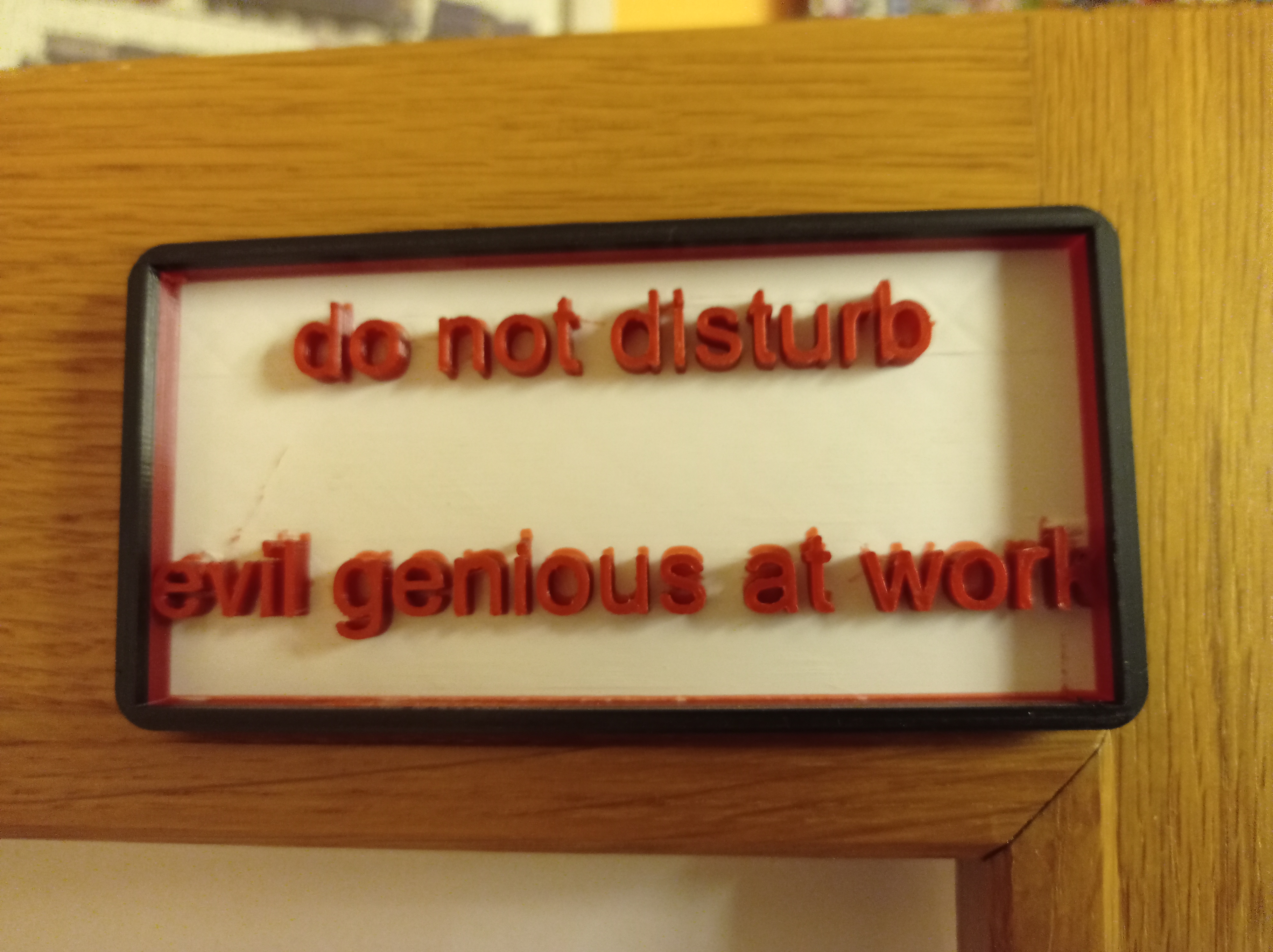 signs (do not enter genious at work, do not disturb evil genious at work)