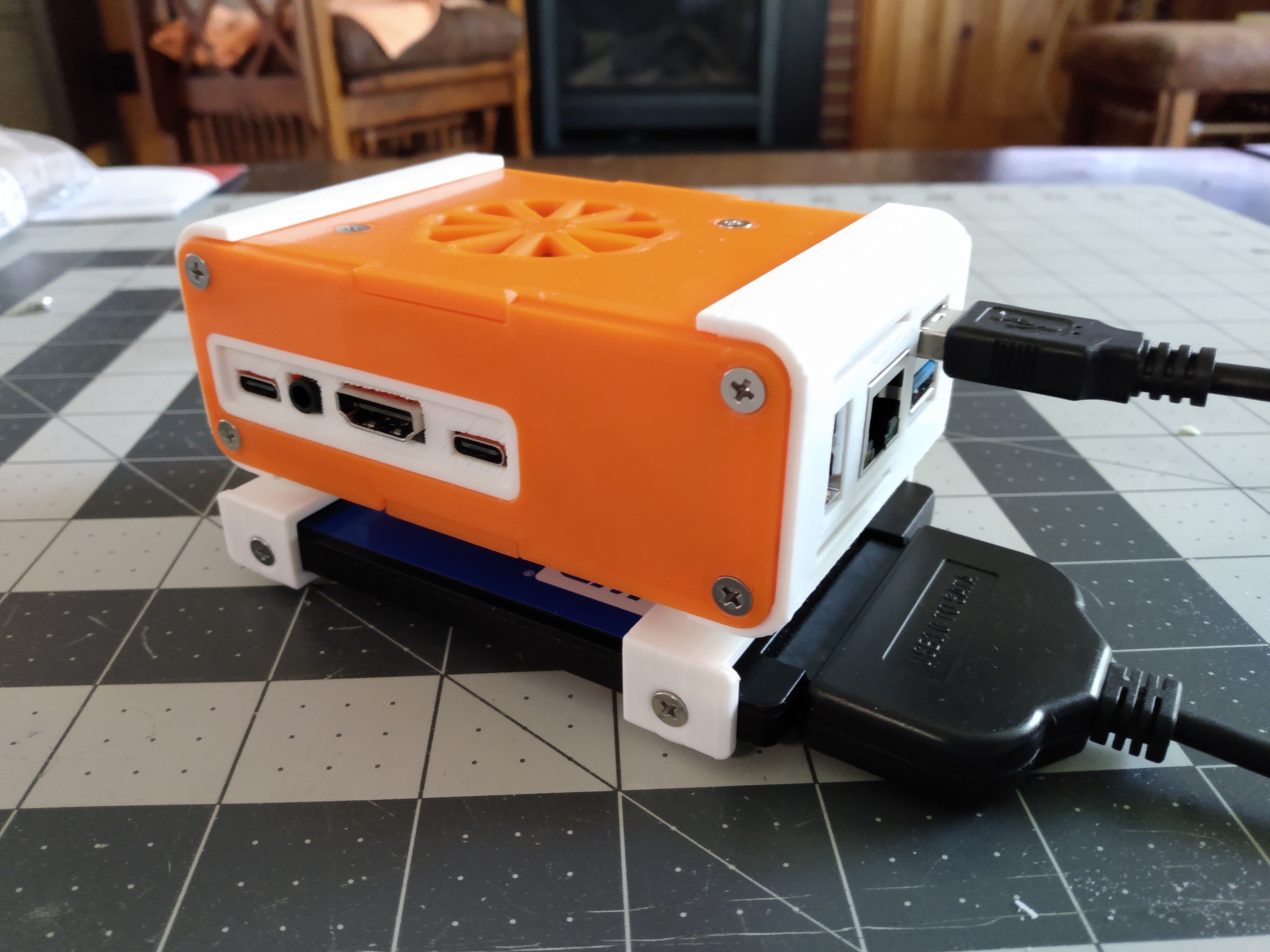 Orange Pi 5 Case with External 2.5" SSD Mounting Bracket and 40x10 fan.