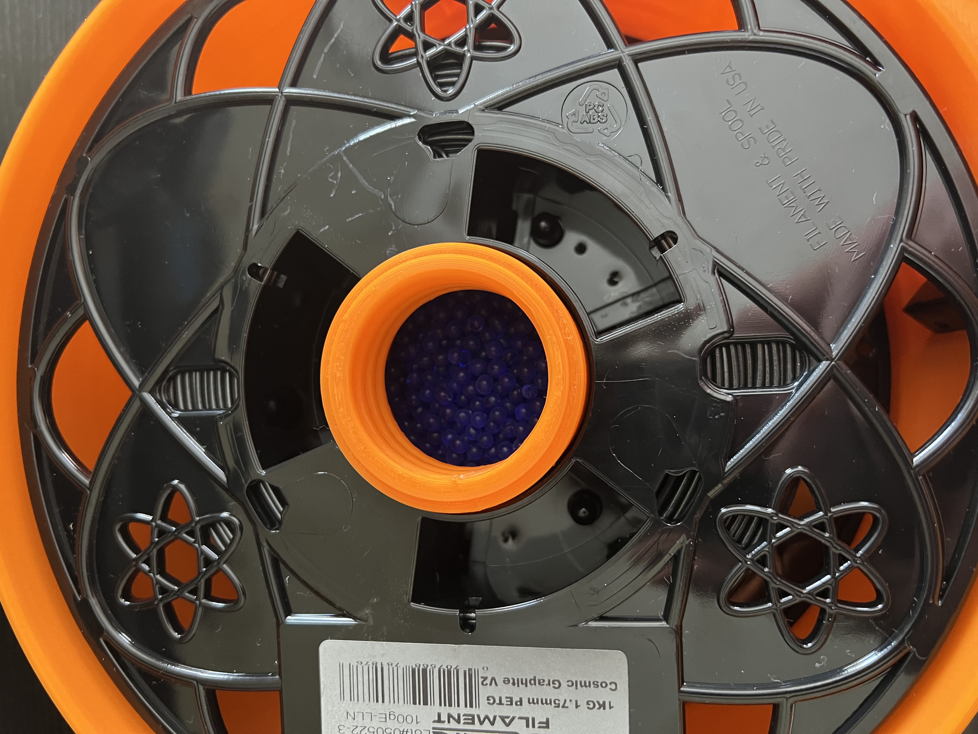 DryboxSpoolholder for Atomic 1kg Filament Spools with desiccant reservoir and humidity sensor