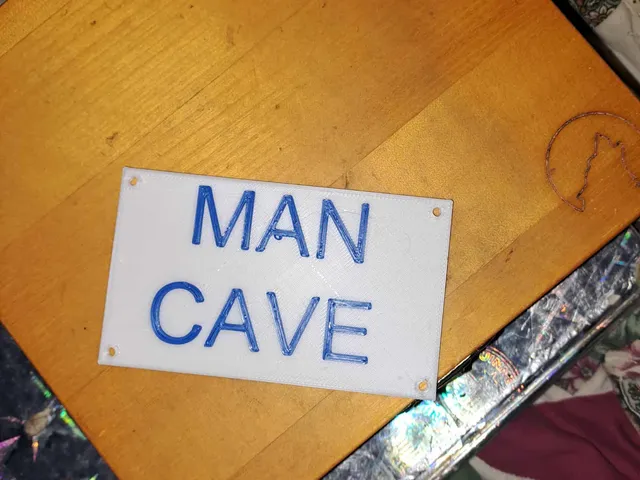 minimalistic man cave sign