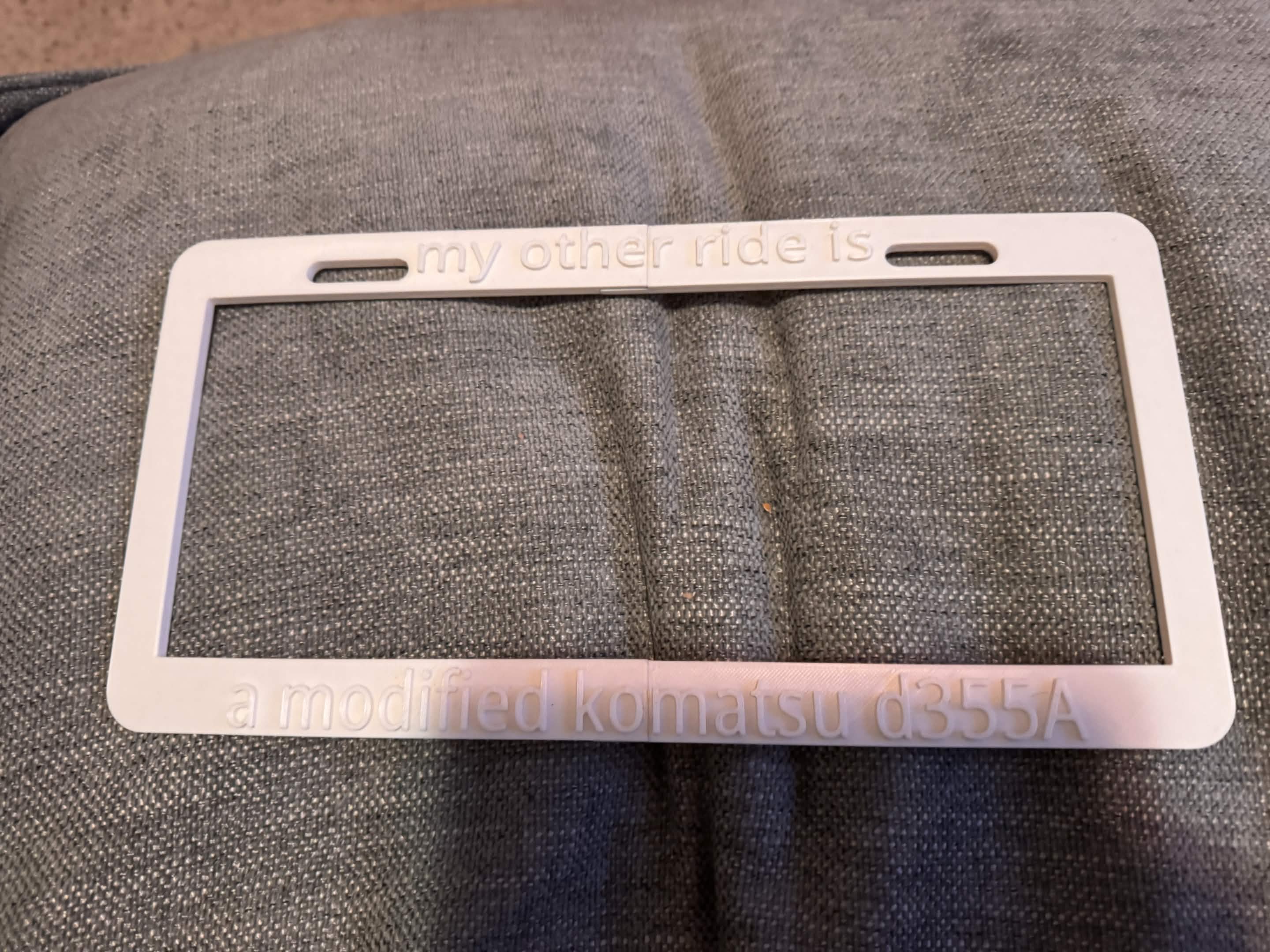Split (kill)dozer license plate frame