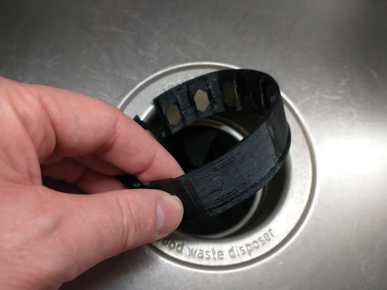 Spoon-Saver Garbage Disposal Splash Guard