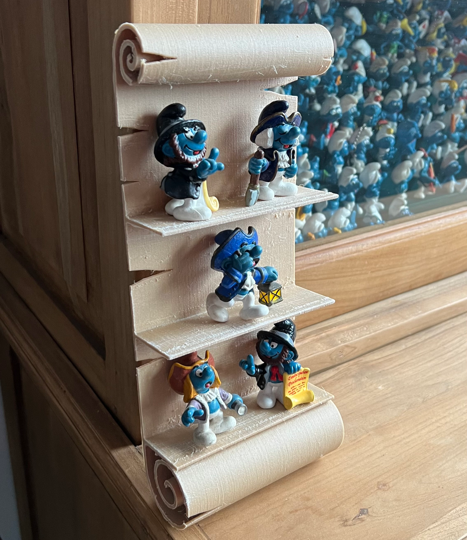 Scroll display for historical Smurfs