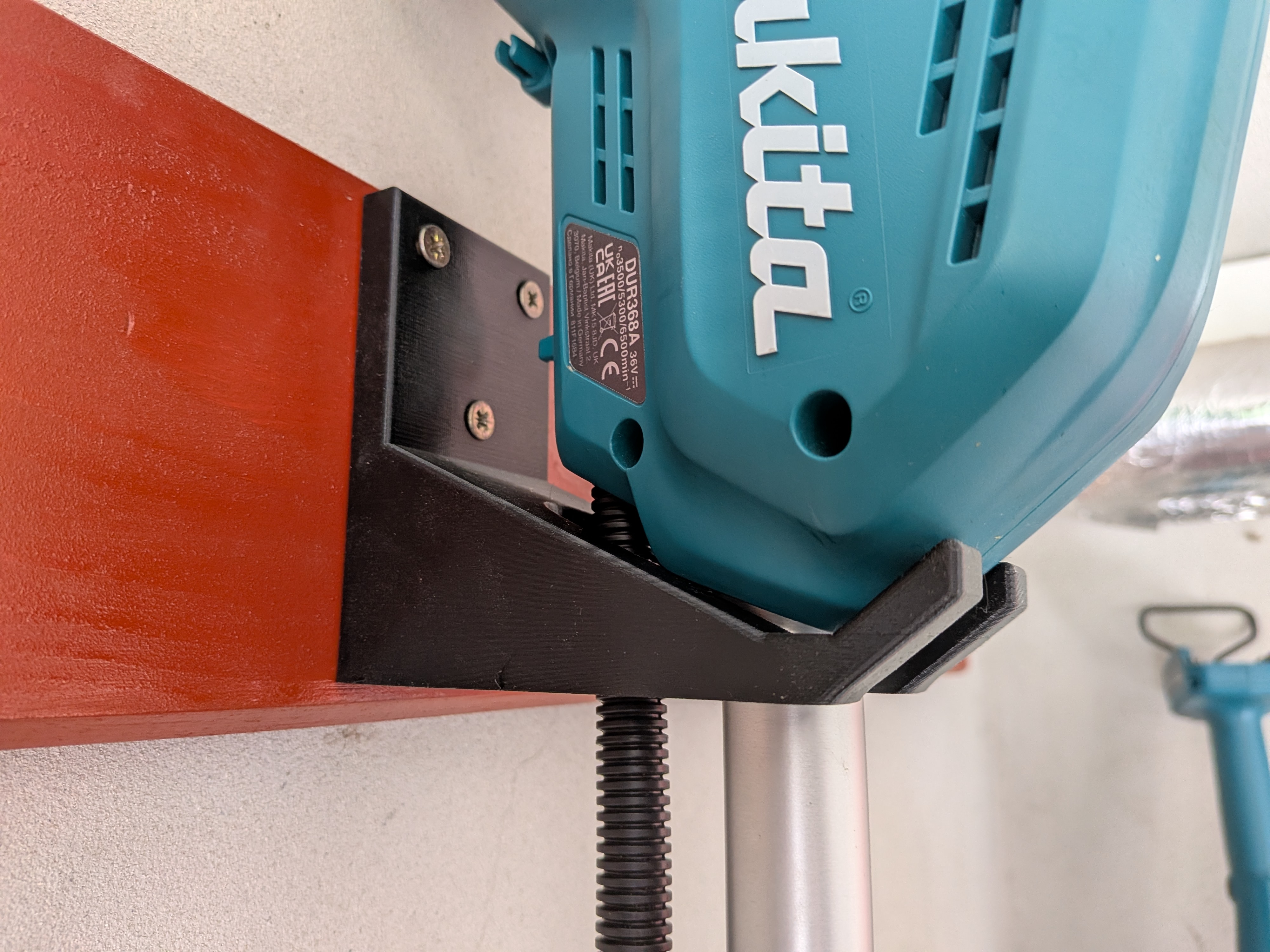 Makita brush cutter holder