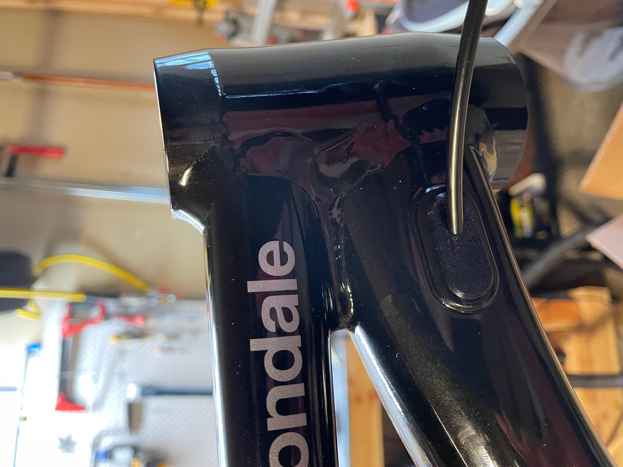 TPU Grommet for internal cable routing on Cannondale bike frame. by