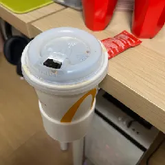Cup holder (slides under desk)