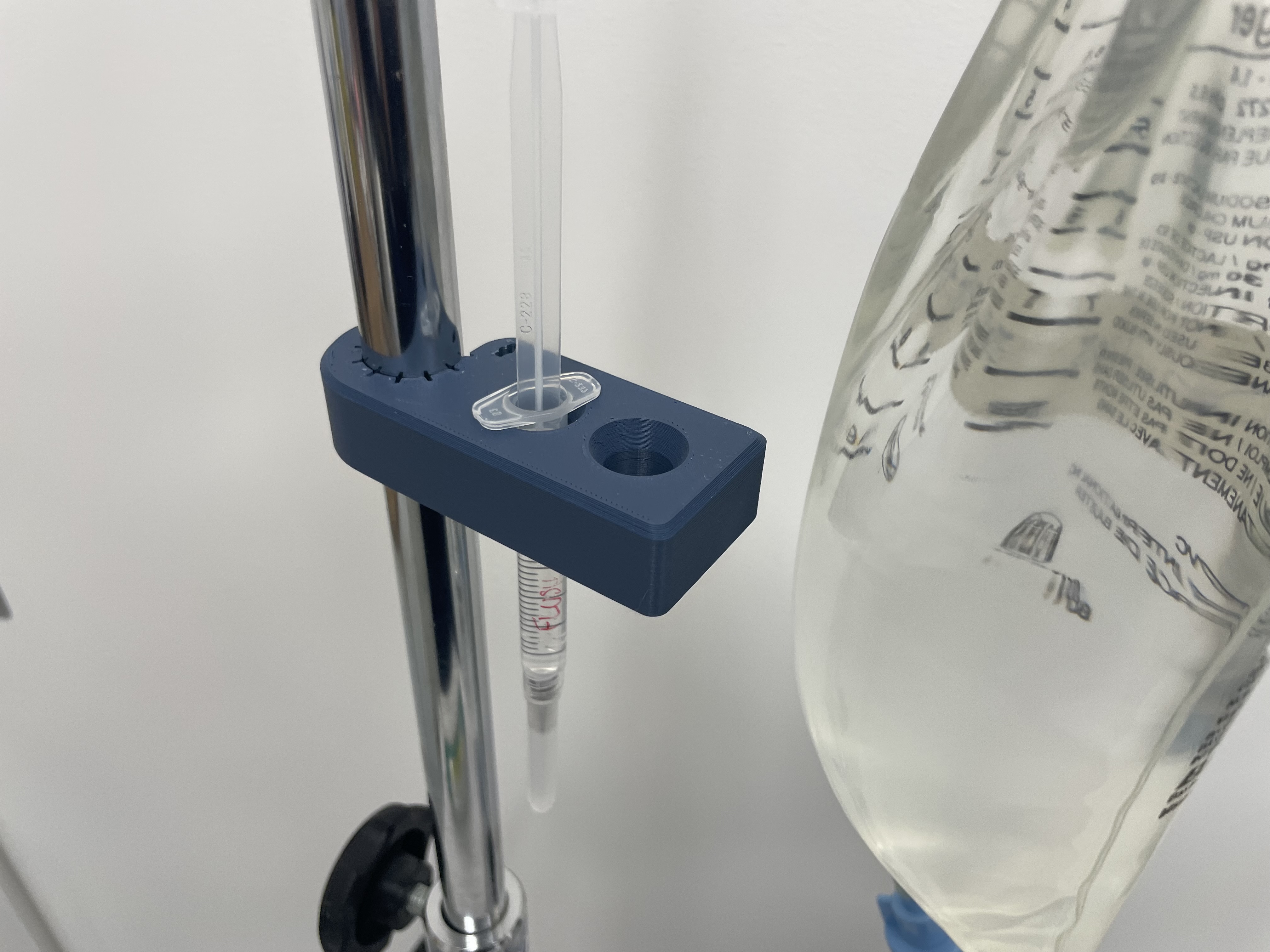 Syringe holder with IV pole clamp by Adam Download free STL model