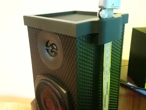 Speaker caliper holder