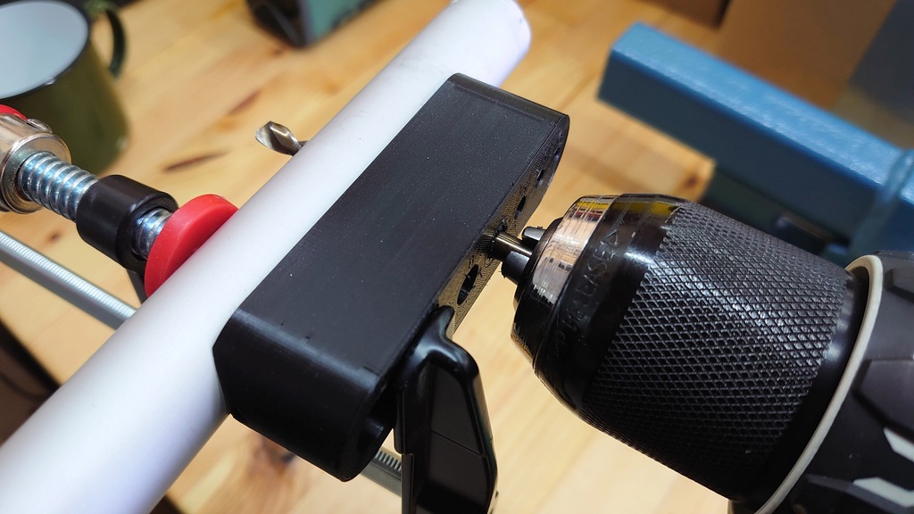 Drill guide for pipes and corners