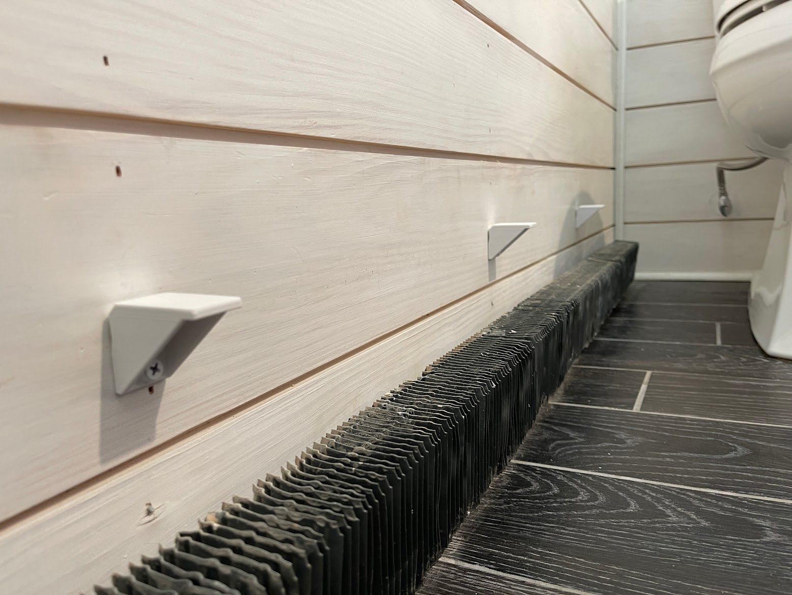 Baseboard heater cover wall bracket by Troye Stonich Download free