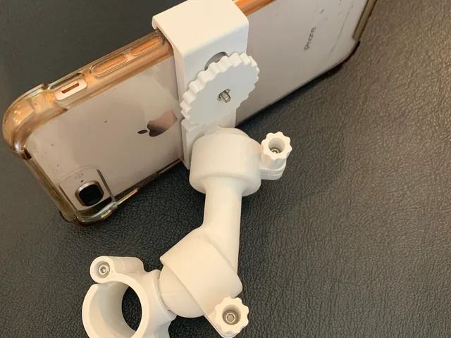 "Plasticlamp" Multi-Purpose Clamp: Adjustable Phone Holder, Magnetic Ring Option, Camera Mount, and Flashlight Support