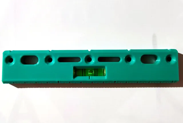 Mini ruler for electricians with spirit level