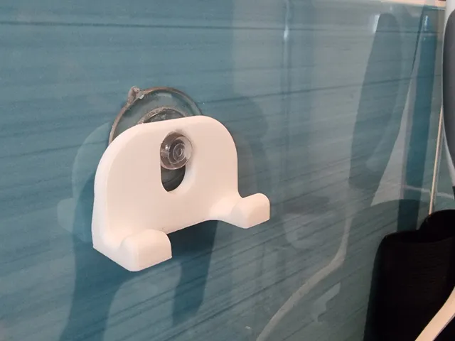 Wall razor hanger