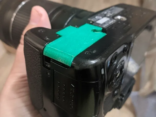 Canon 450D 500D 1000D battery door replacement
