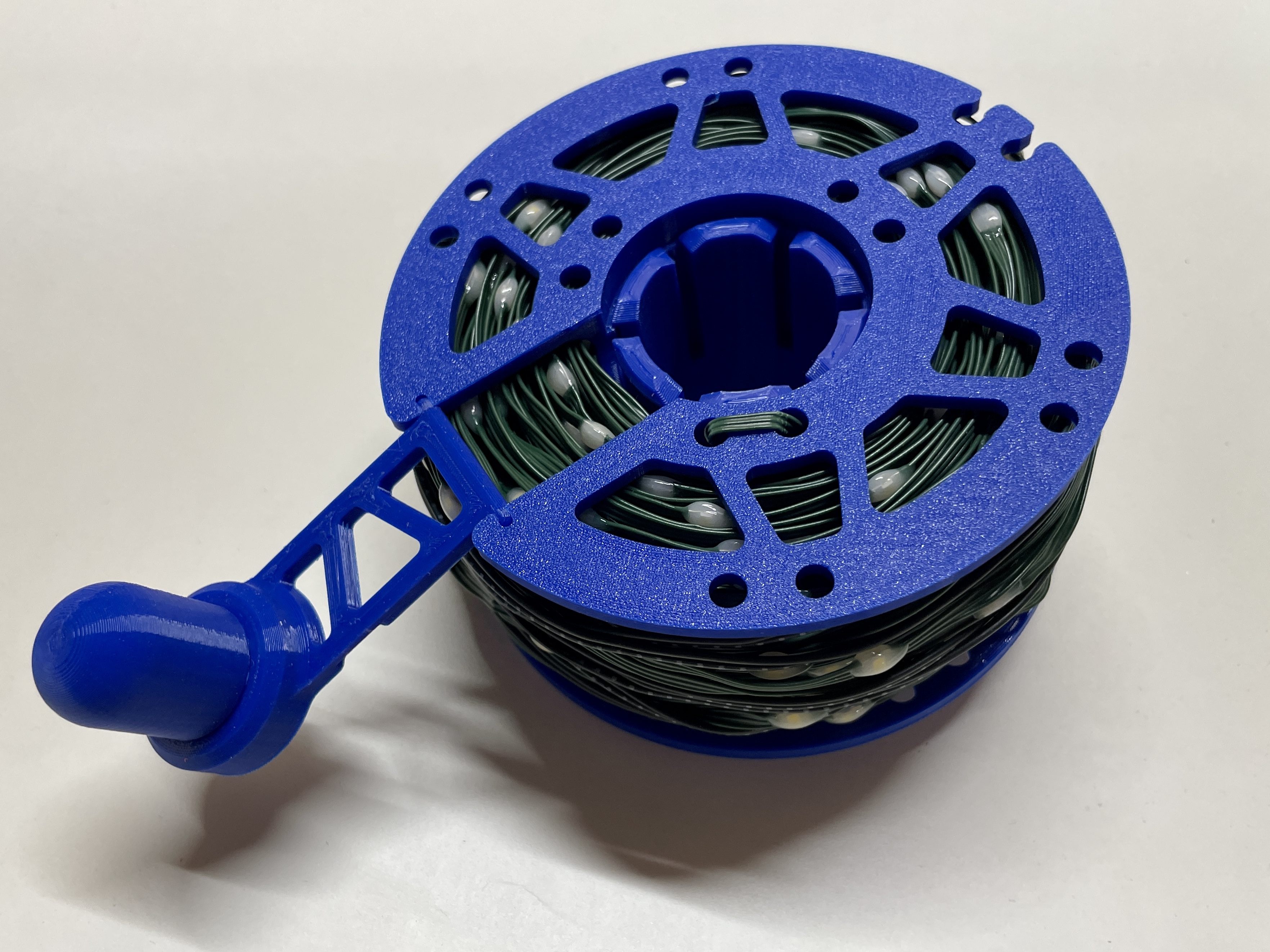 Compact Cable Reel with Integrated Folding Handle by Fulcrum Design, Download free STL model