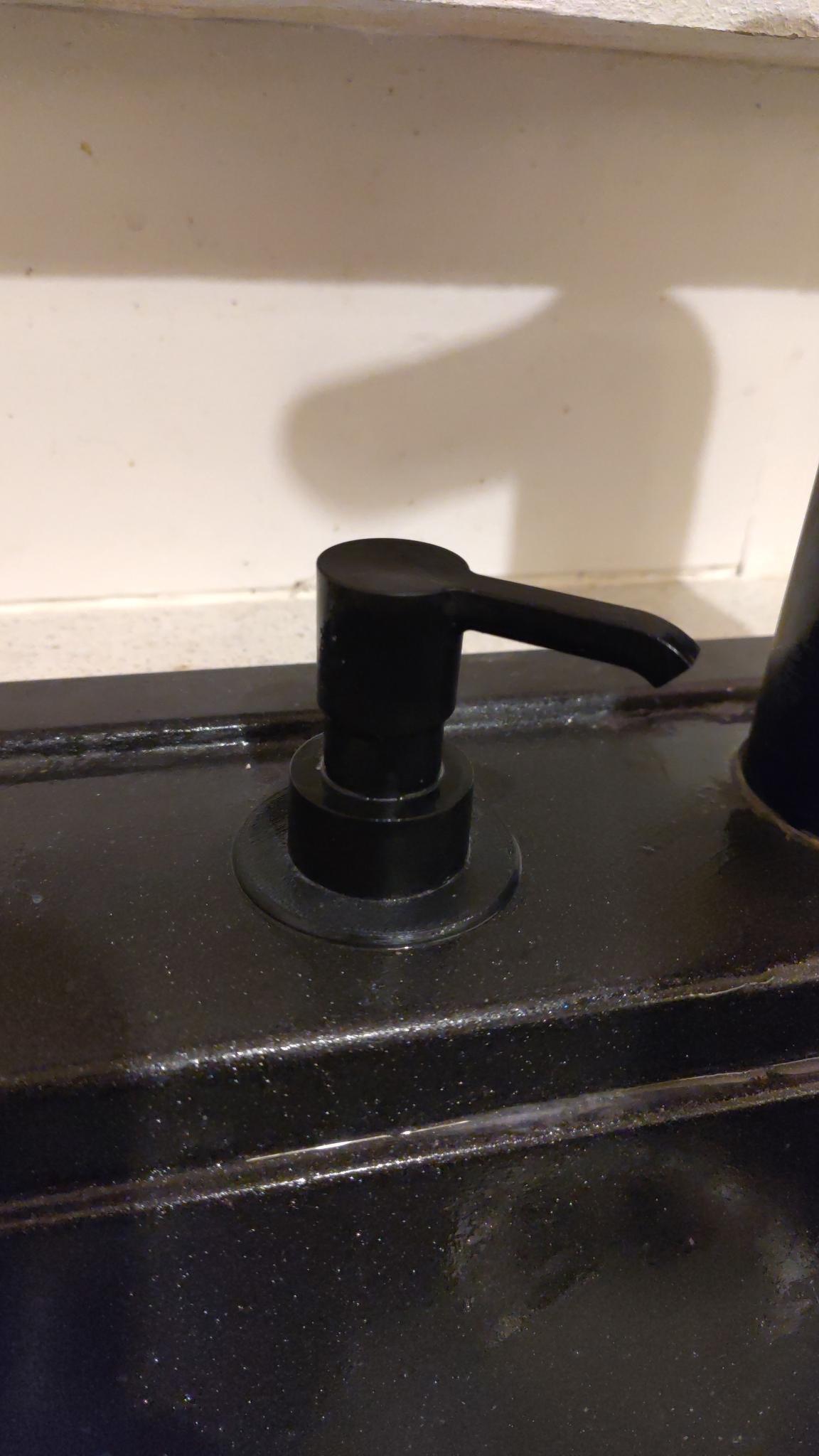 Soap dispenser holder for sinks