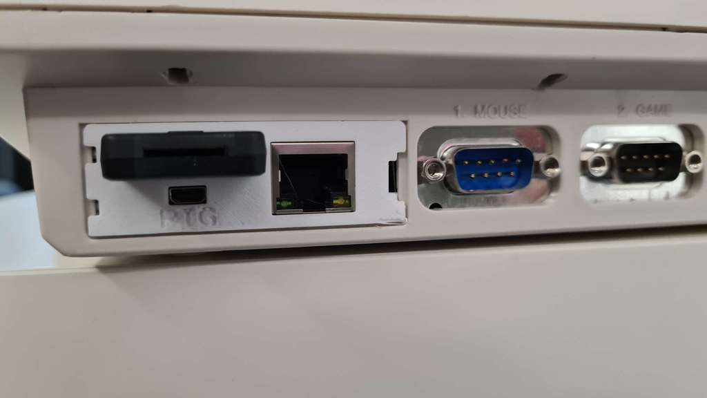 A1200 Back Trap Door MicroHDMI, Network and internal microSD