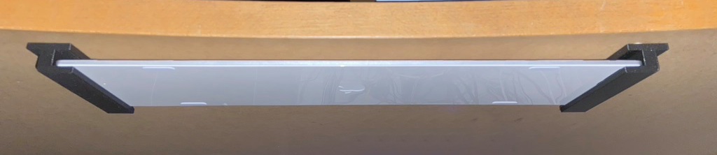 Keyboard storage under desk
