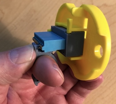 Holding aid for Clamp style DMX connectors