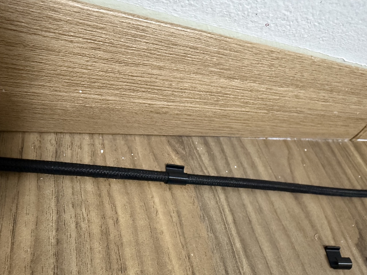 Ethernet cable clip for baseboard