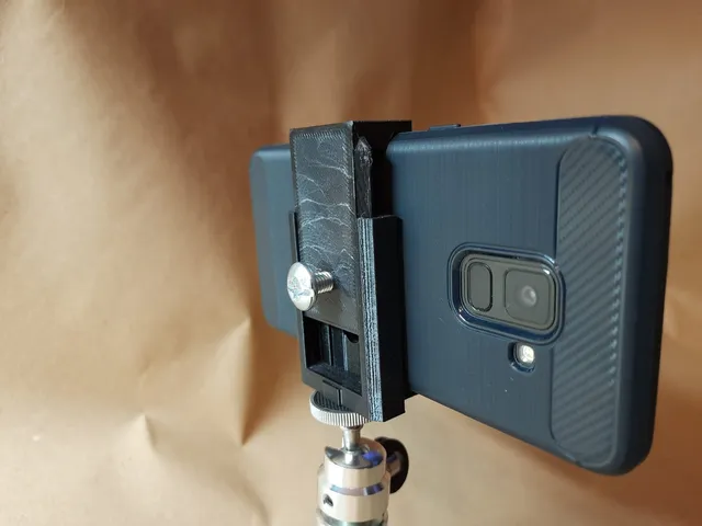 Phone holder for tripods