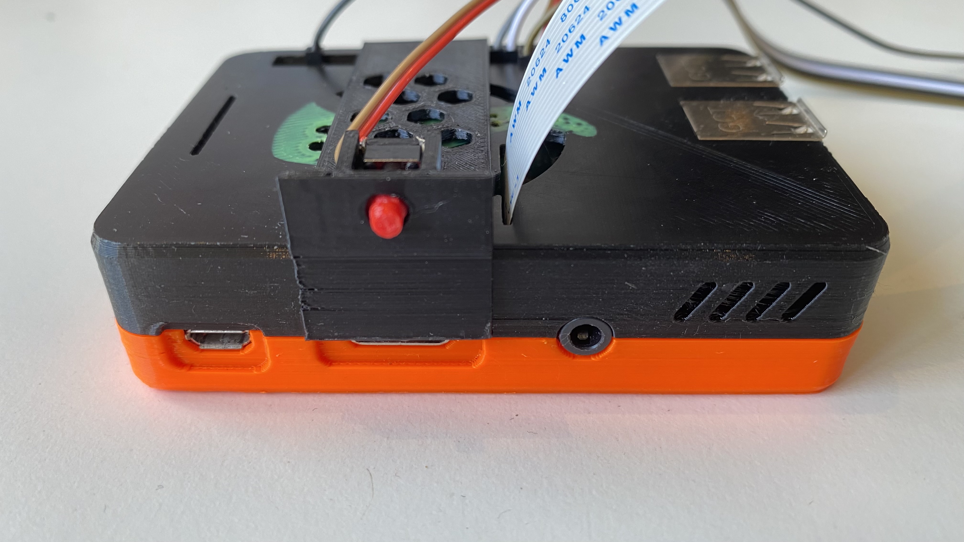 Snap-on bracket with tactile switch for Malolo's snap fit Raspberry Pi 3 Case (OctoPrint GPIO shutdown button)