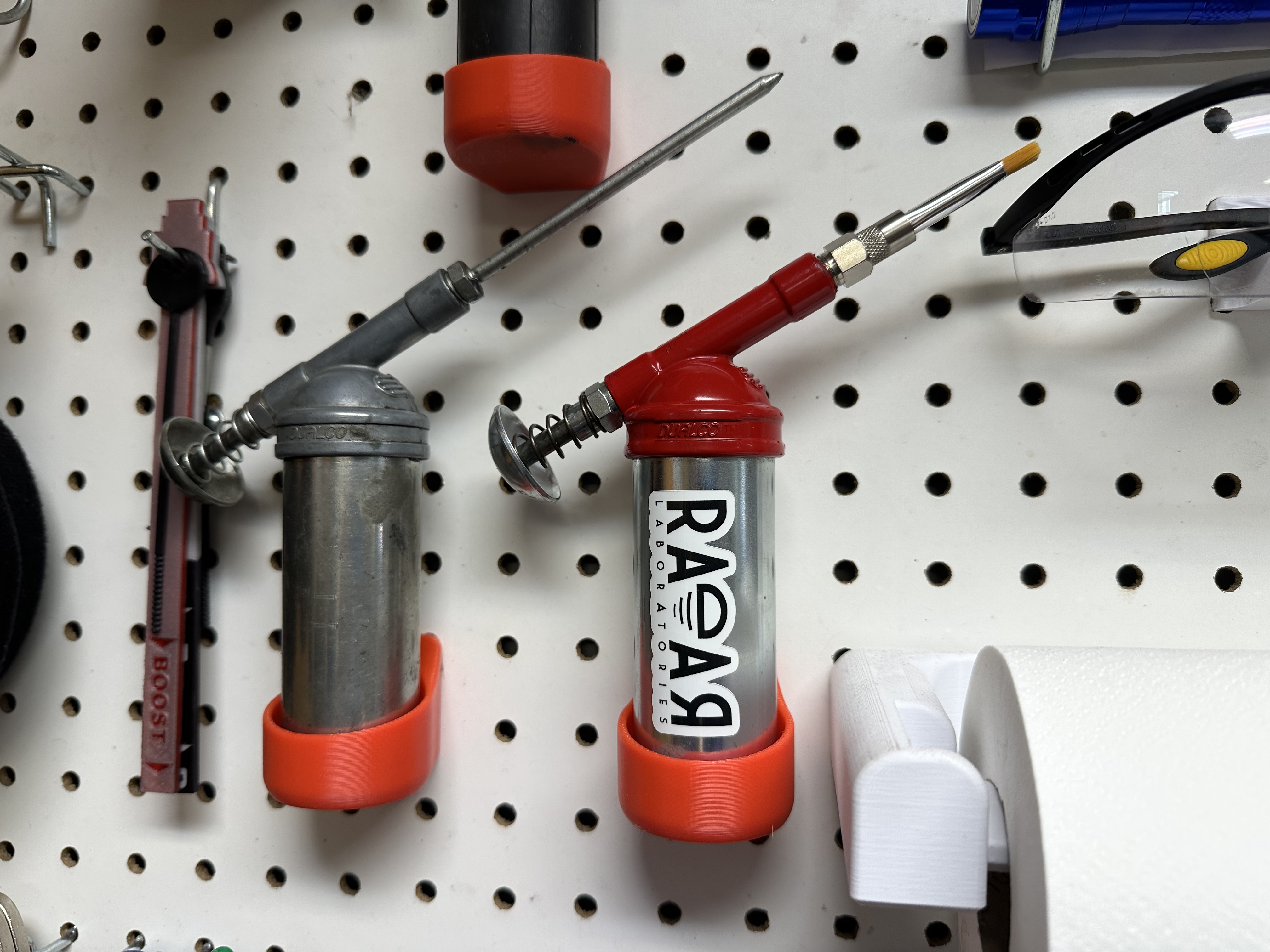Pegboard holder for DualCo grease guns (42mm ID)