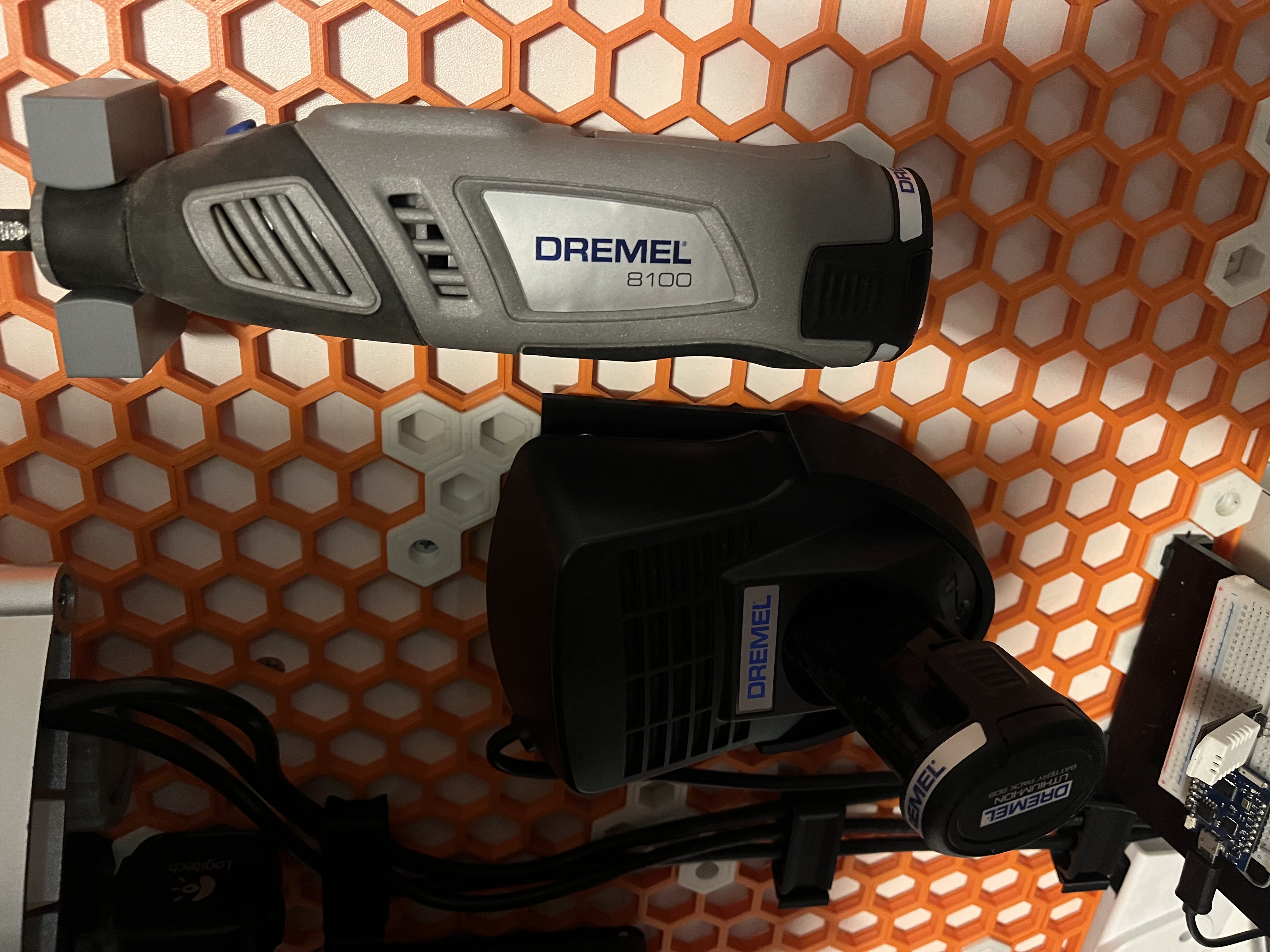 Honeycomb Storage Wall DREMEL 8100 battery charger holder by parentpj Download free STL model Printables