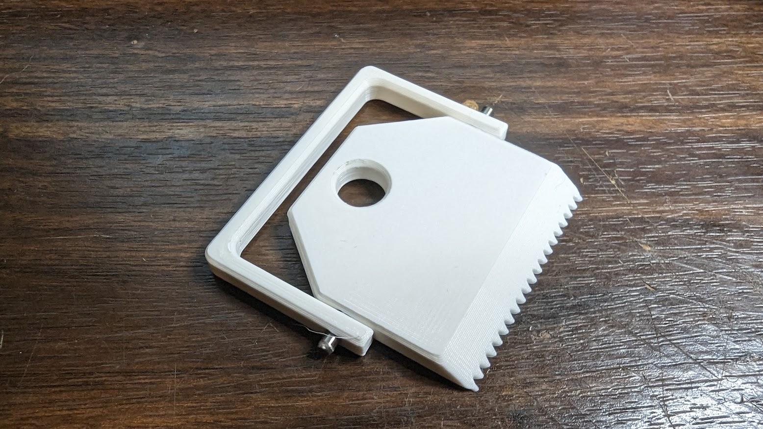 Weight buckle for knitting machine