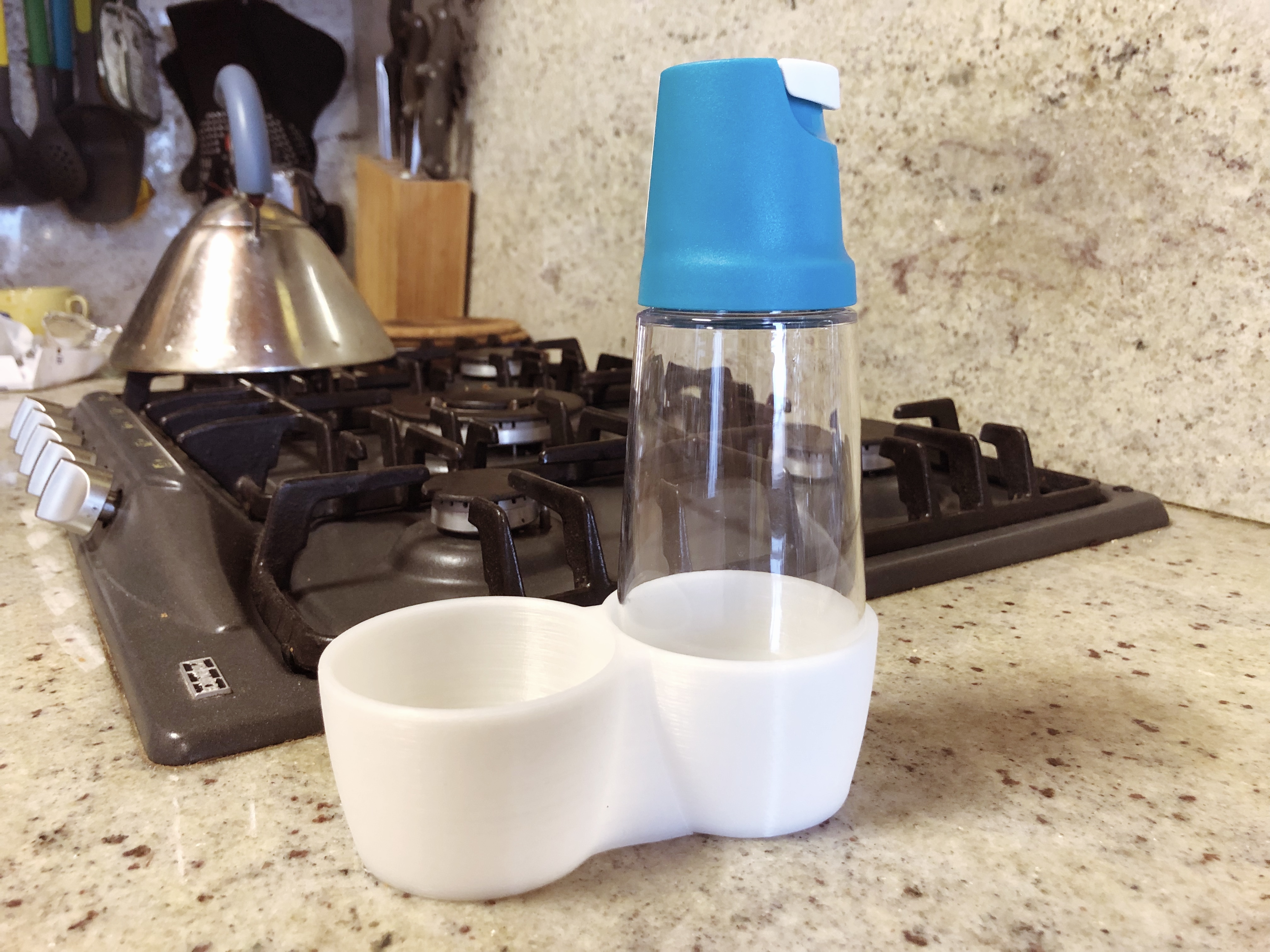 Holder of couple Tupperware tilt'n serve dispensers