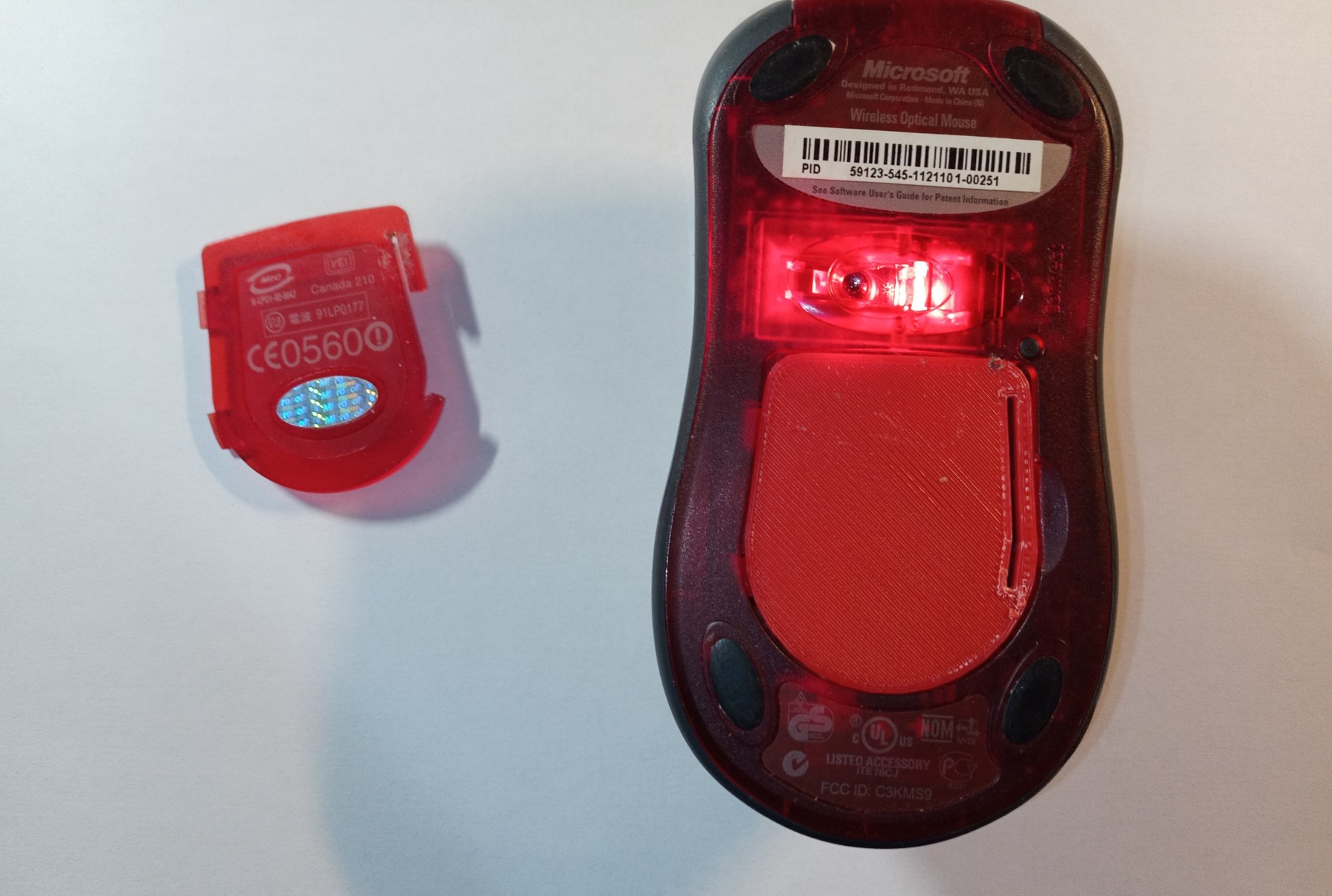Battery compartment door Microsoft Wireless Optical Mouse