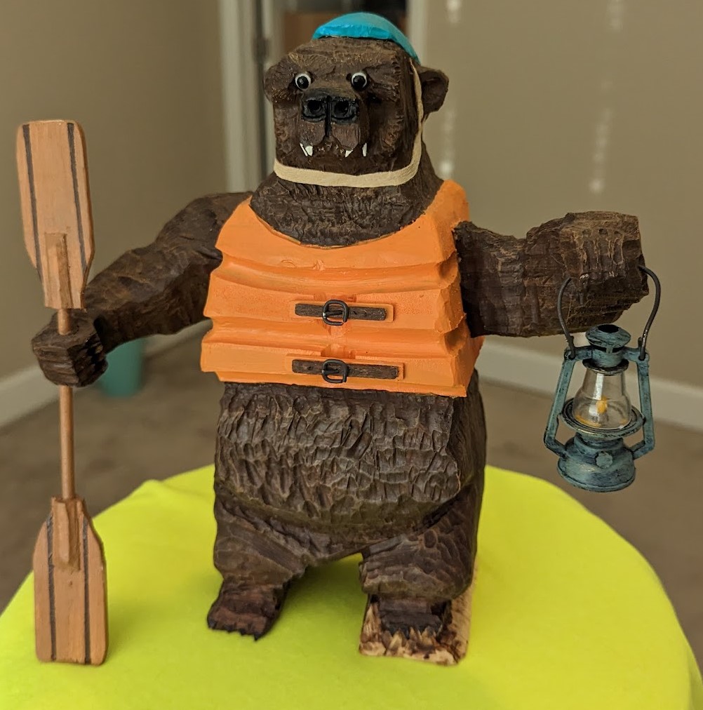 Rafting grizzly bear