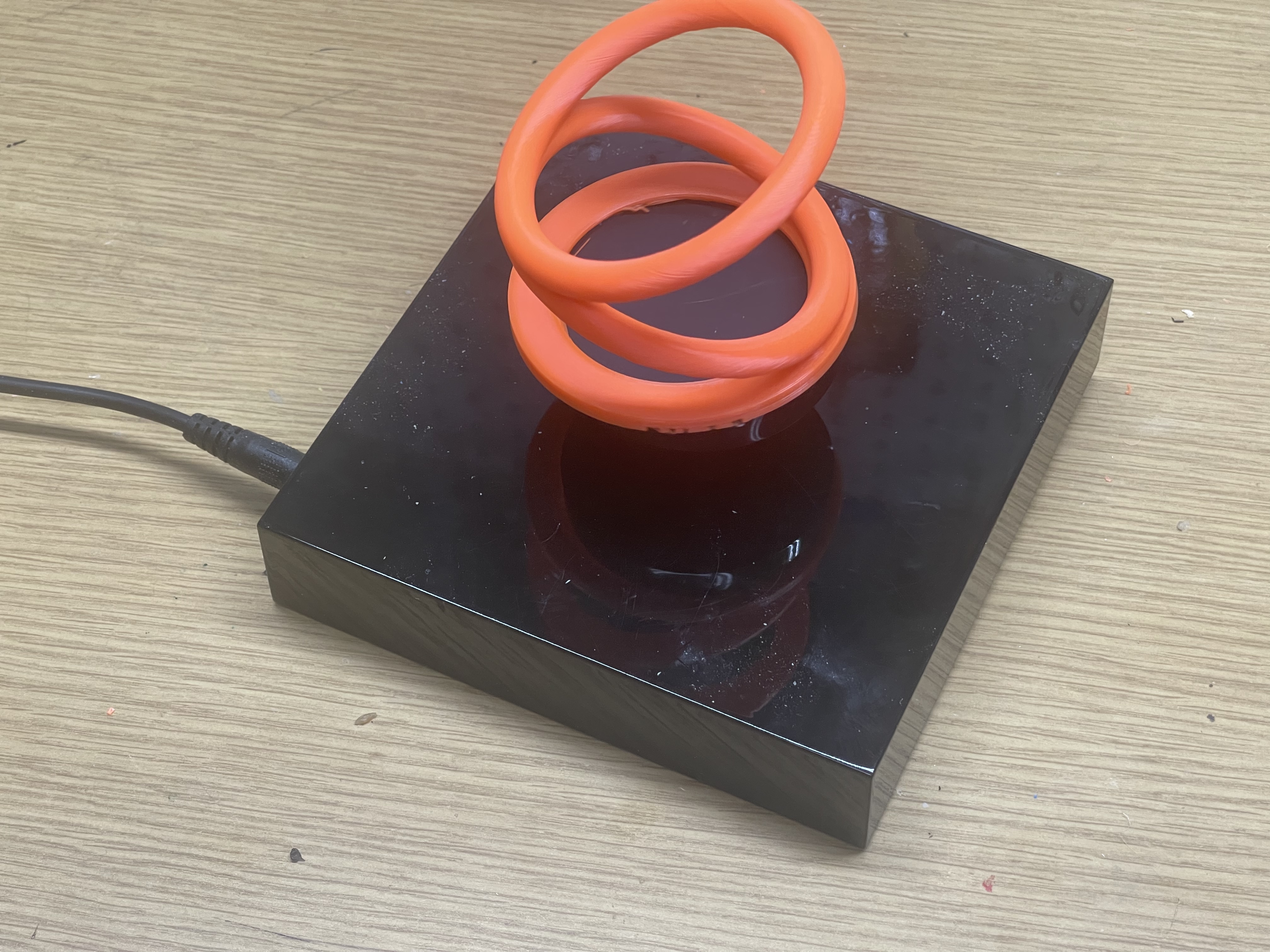 Nutating (Rotating) Rings - Optical Illusion with 120V Magnet - Rings seem to  around each other in the air.