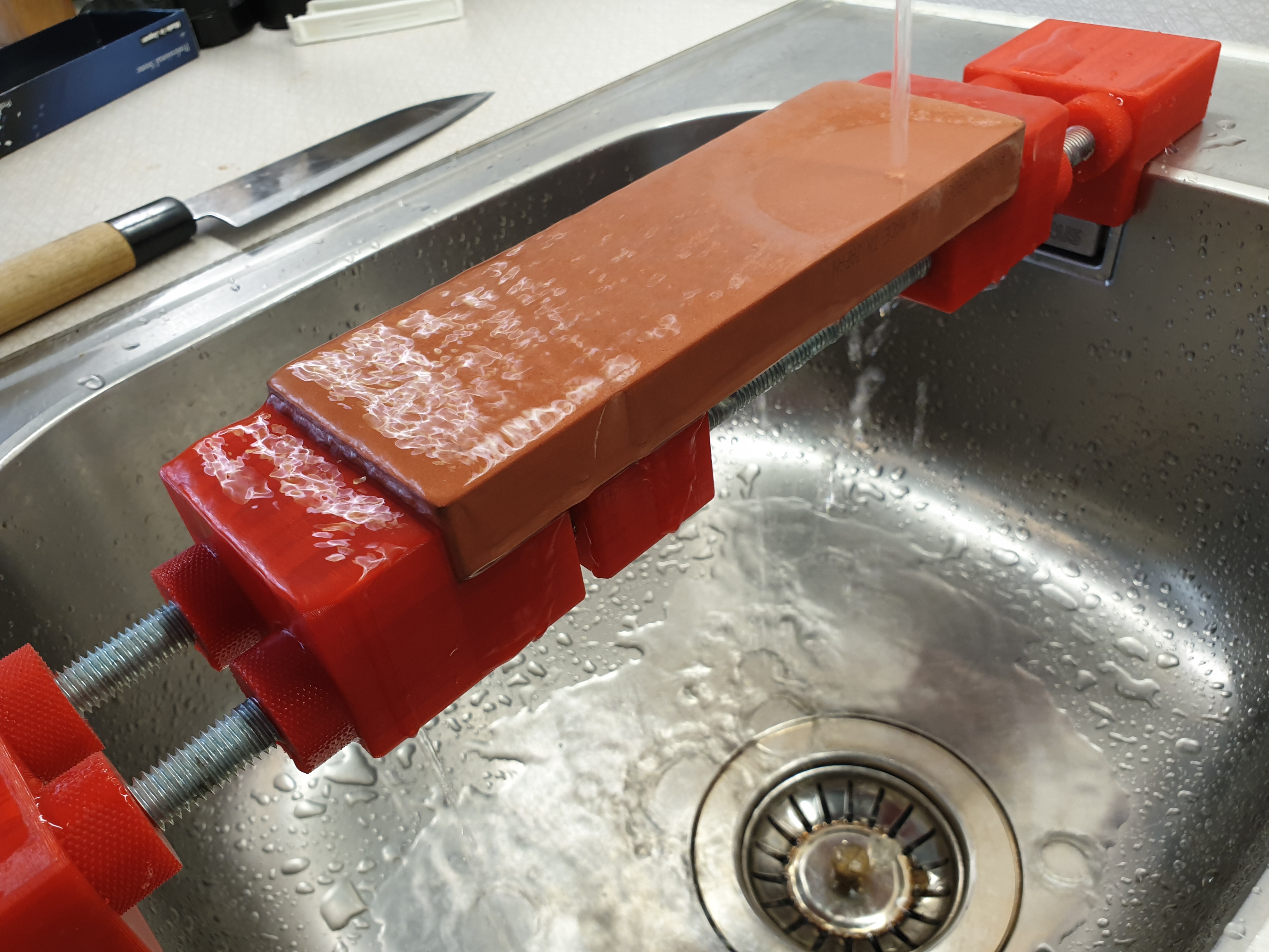 Holder for sharpening stones