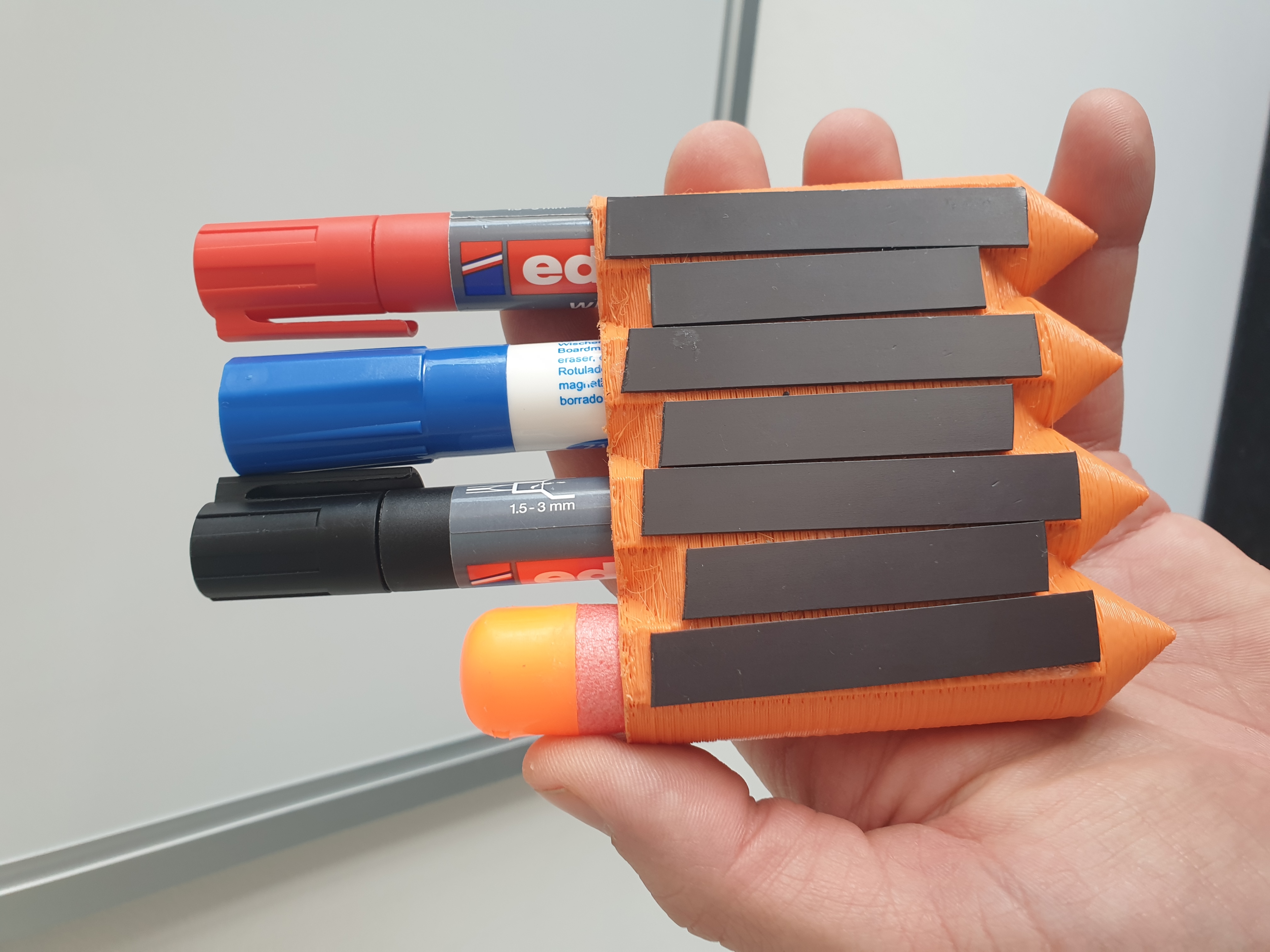 Magnetic holder for whiteboard markers