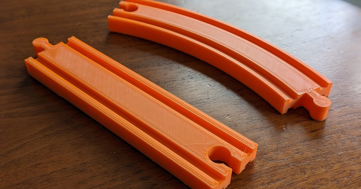 Parameterizable Curved and Straight Toy Train Tracks Compatible with