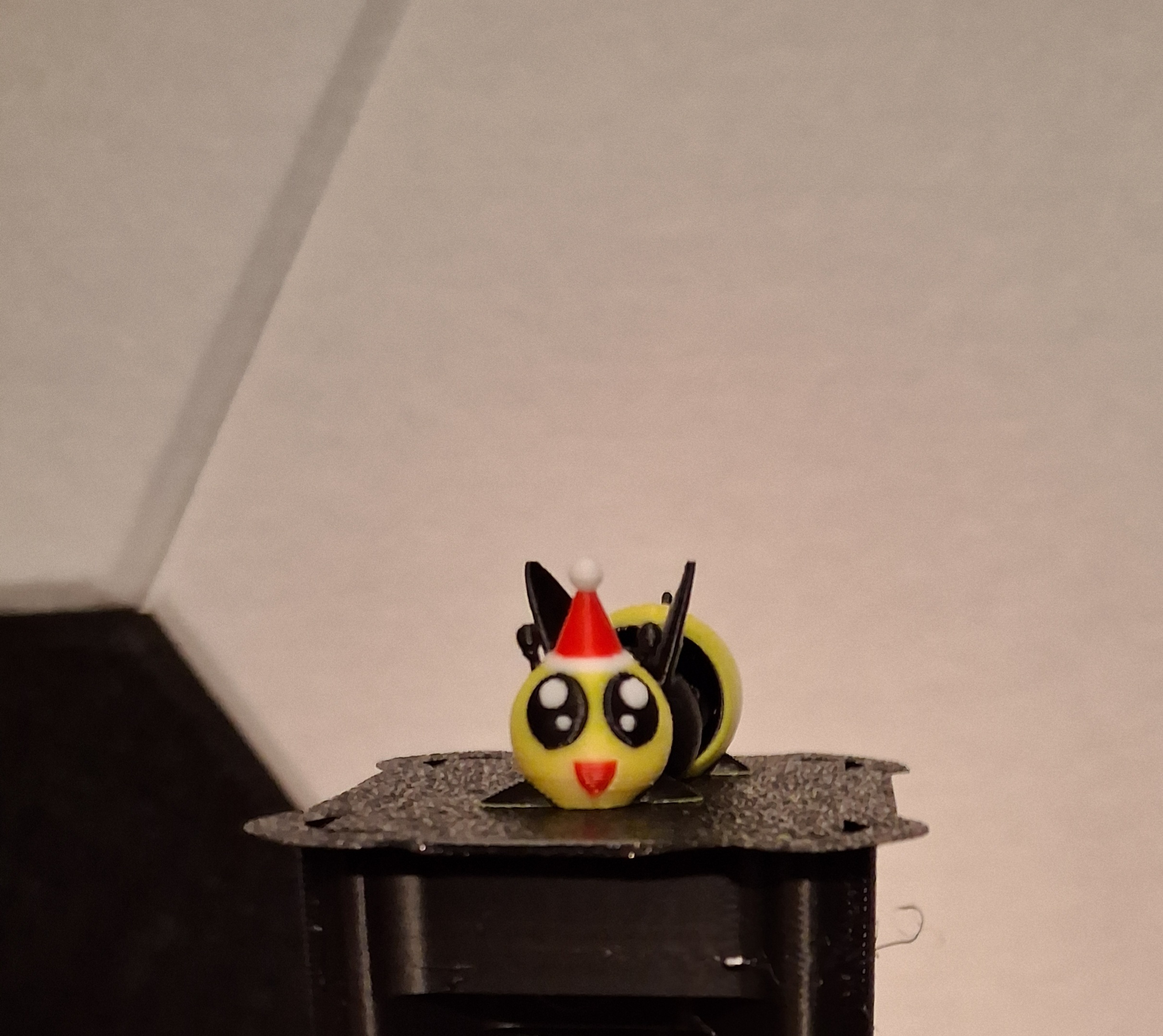 Tiny articulating Santa Bee