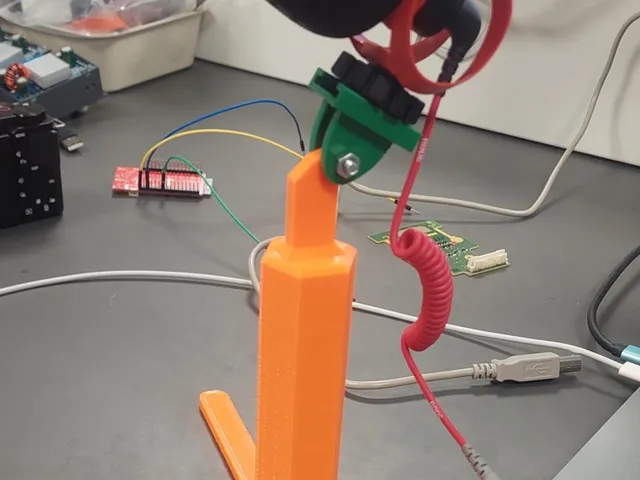 Adjustable stand for camera microphones.