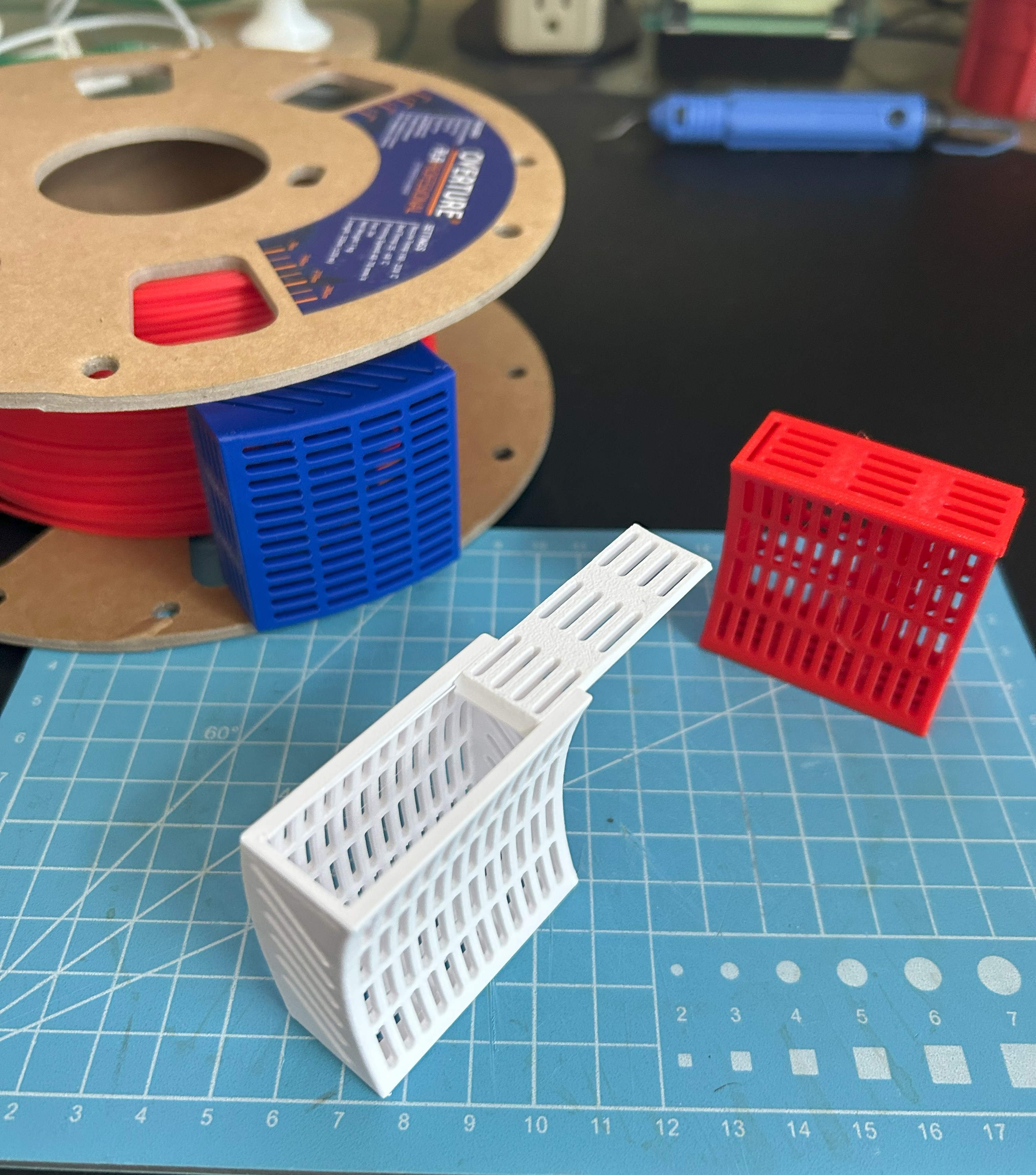 Dessicant holder (curved for outside of spool) with Funnel