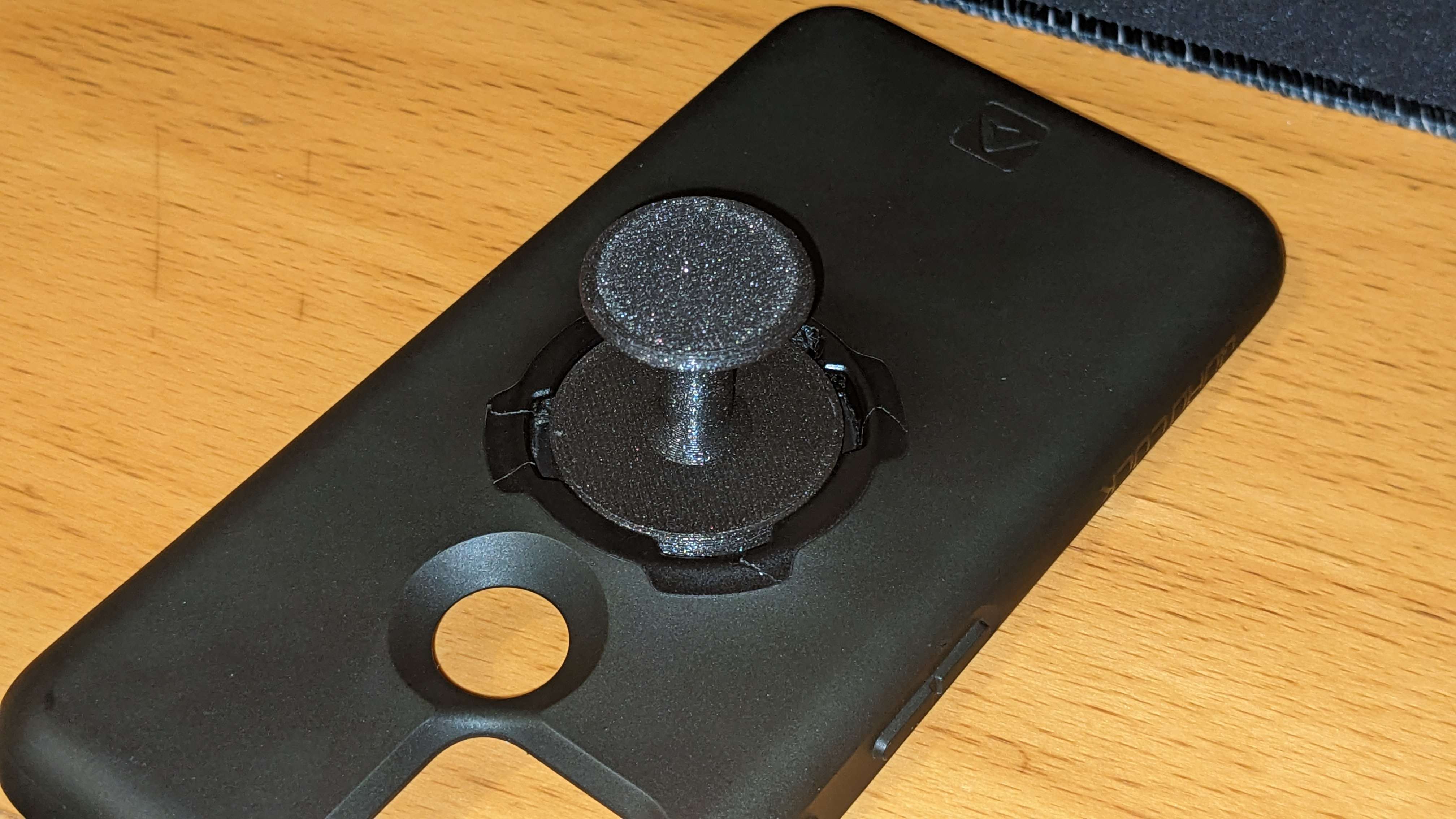 QuadLock Finger Phone holder