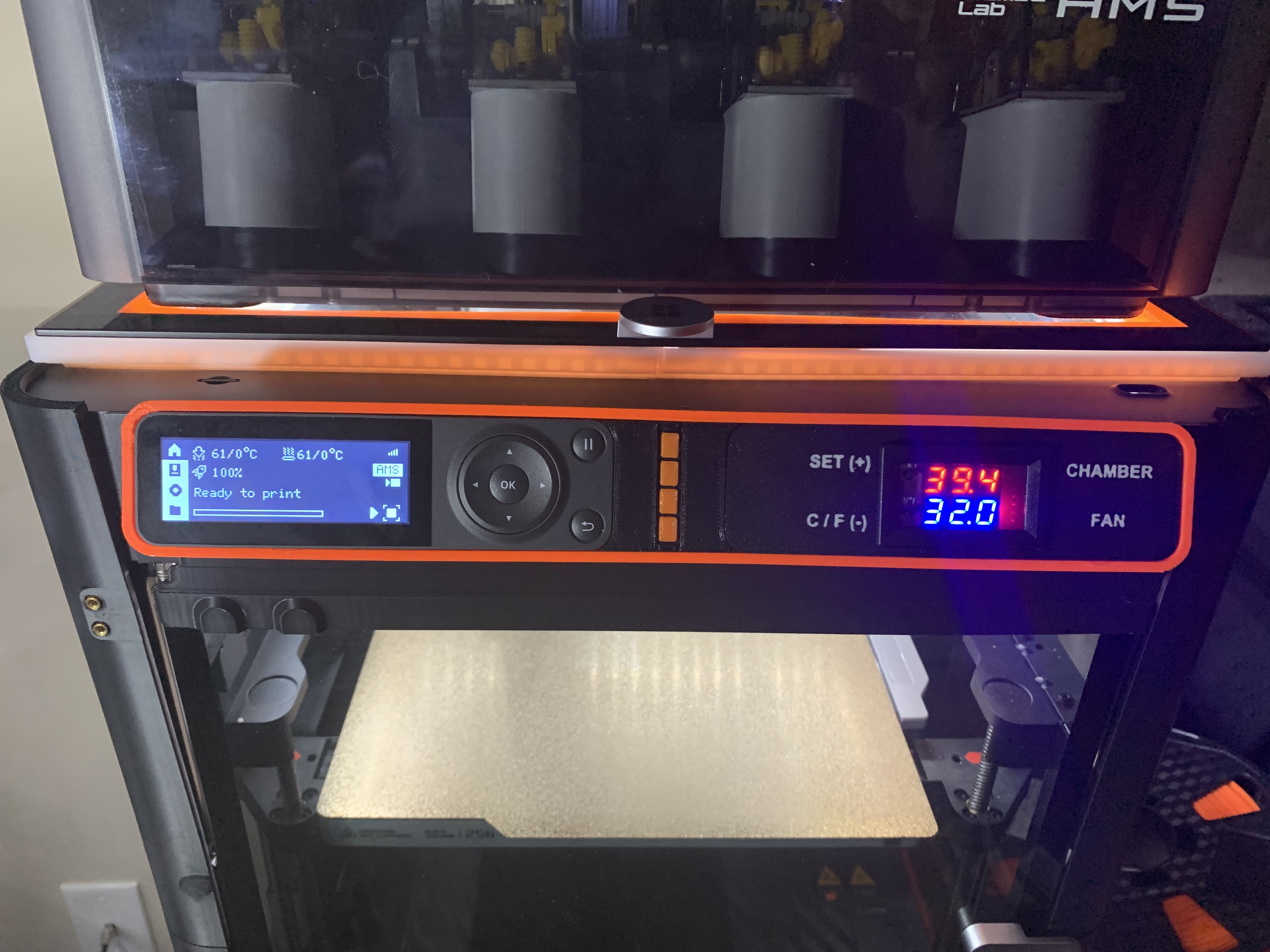 Display holder for chamber fan thermostat