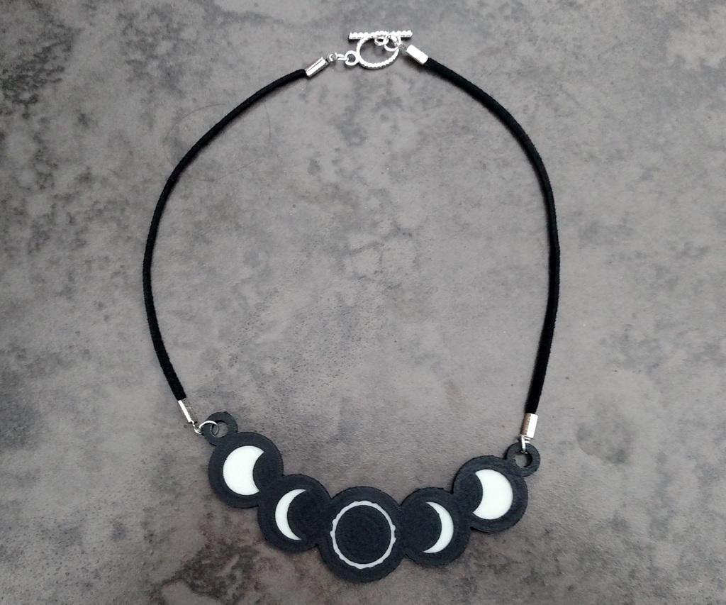 Glowing Solar Eclipse Pendant