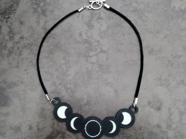 Glowing Solar Eclipse Pendant