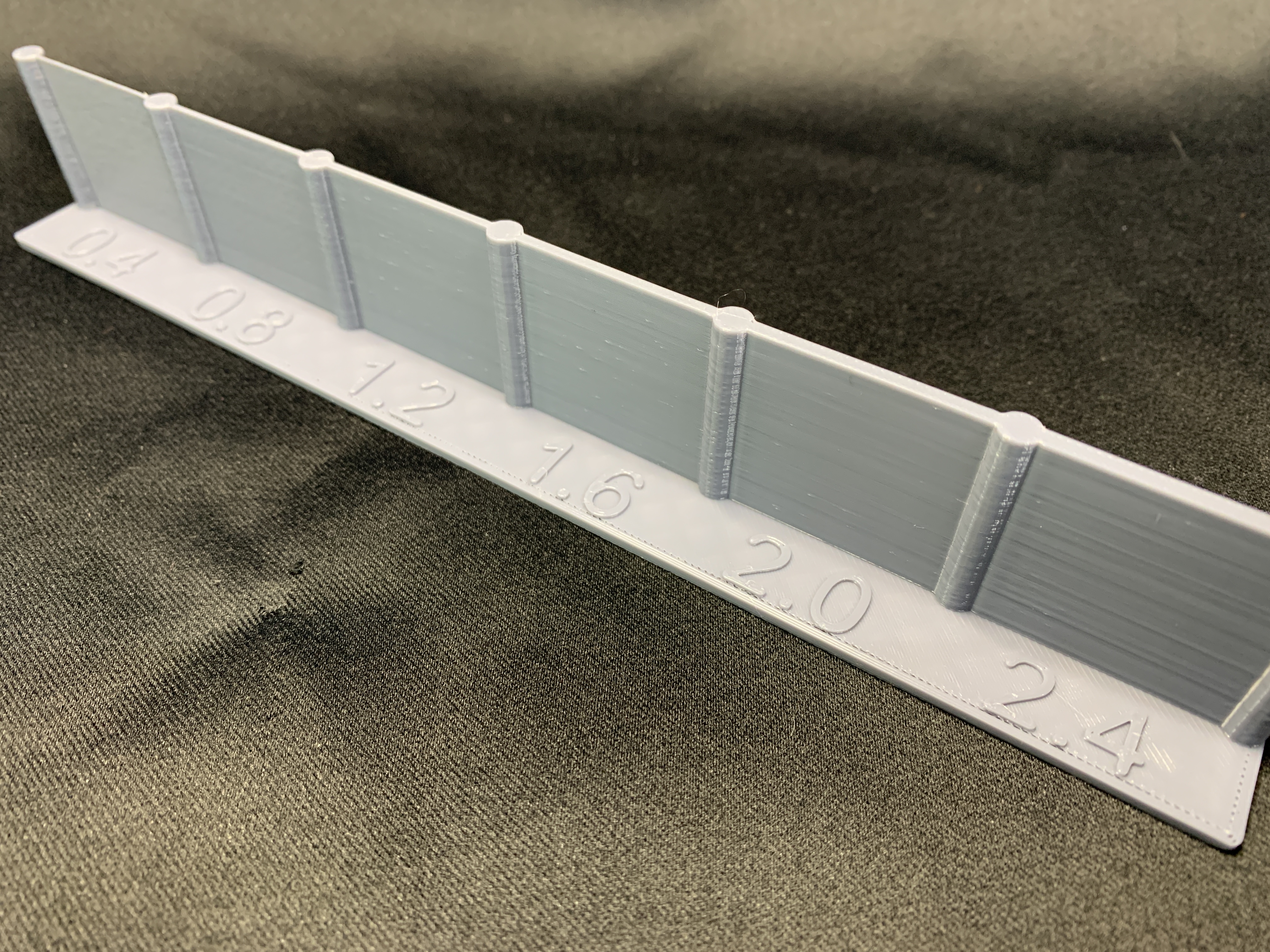 Vertical Wall Thickness Sampler (OpenSCAD)