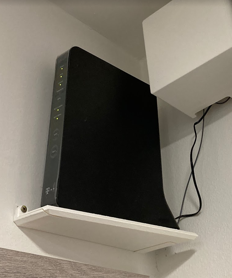 Corner shelf for modem optimized for Prusa Mini by Jan Vlcek