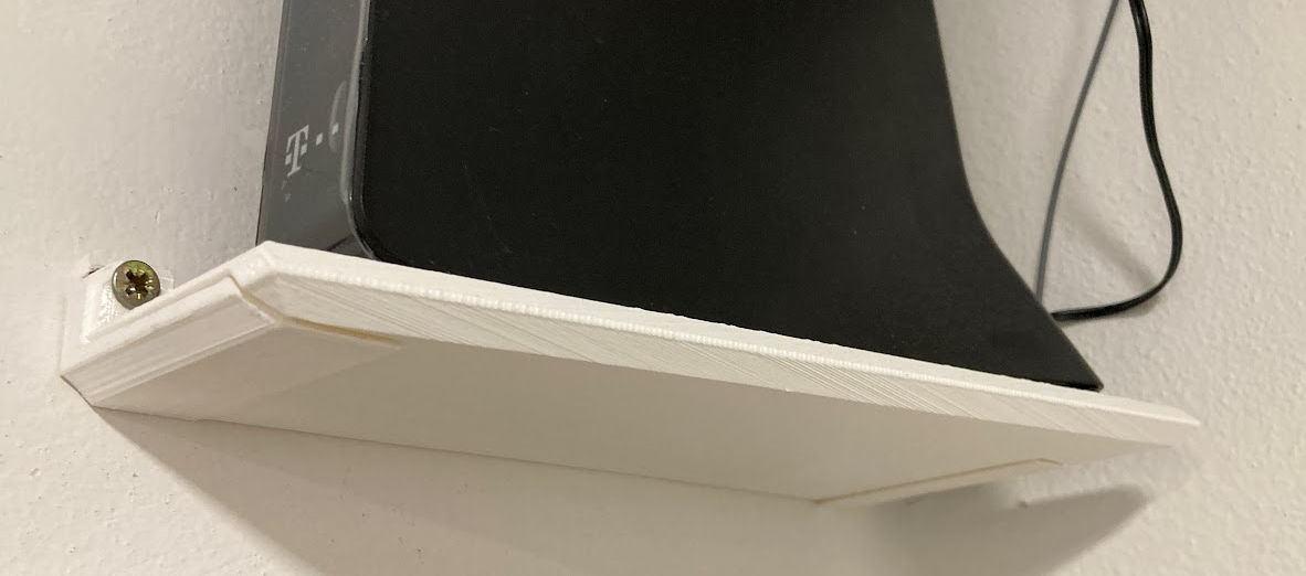 Corner shelf for modem optimized for Prusa Mini by Jan Vlcek