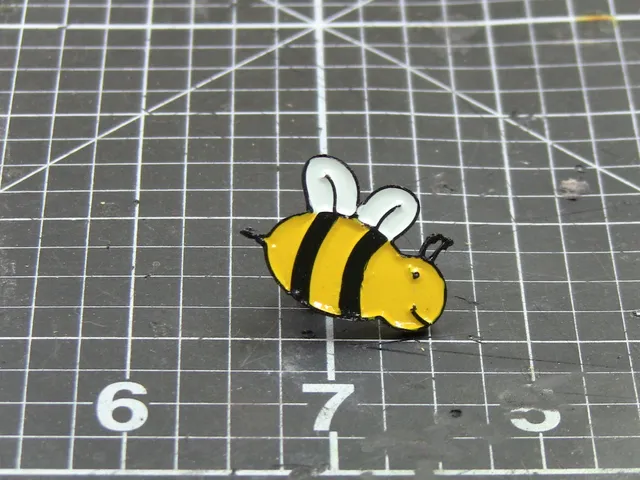 Bee enamel pin